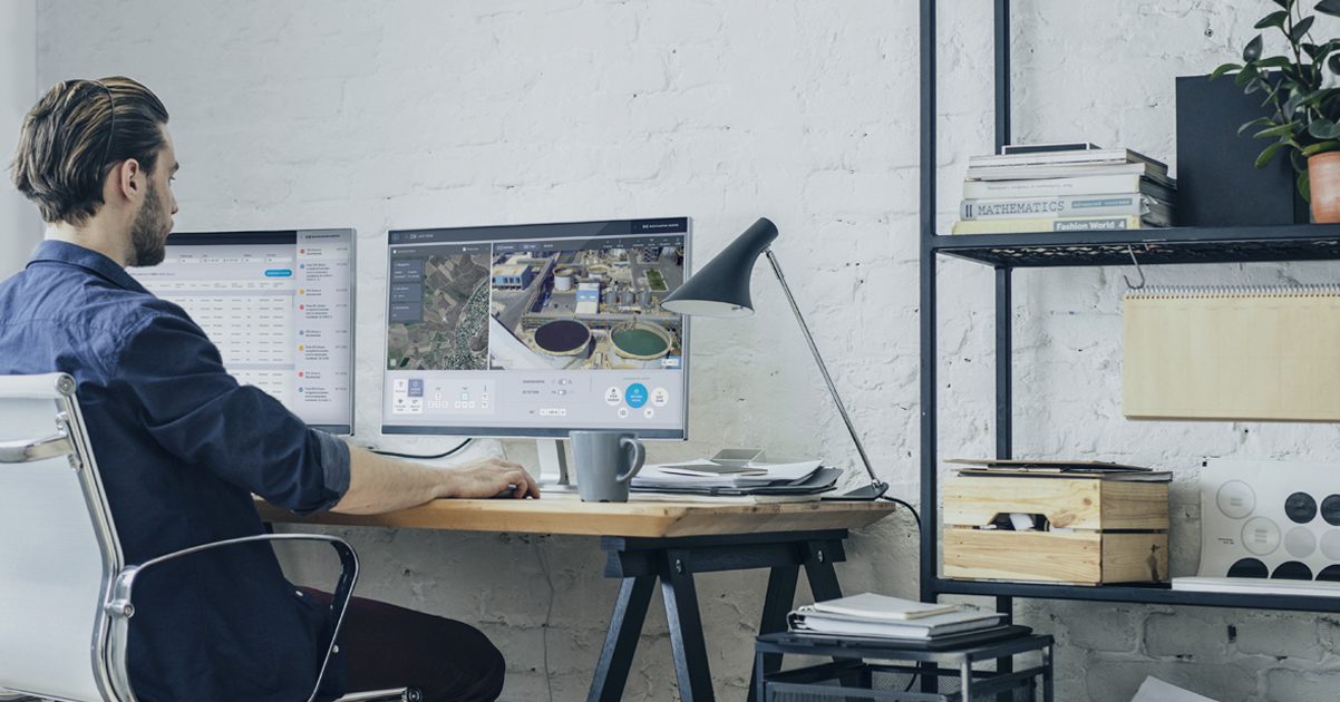 man working at home landing autonomous drones